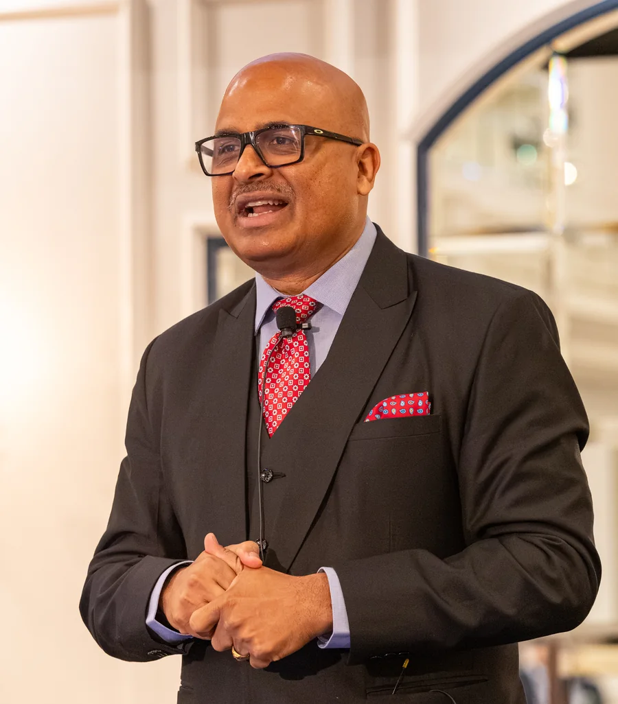 Ravi Teja Bommireddipalli, Founder and CEO of AyattAI, speaking at a keynote